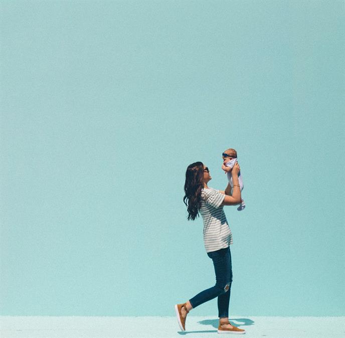 woman holding baby
